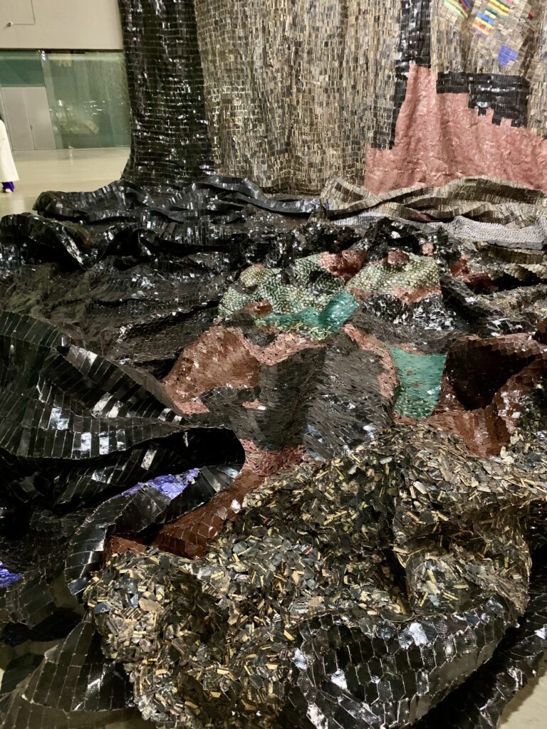 Tate Modern Turbine Hall commission by El Anatsui. Photo by Caroline Banks