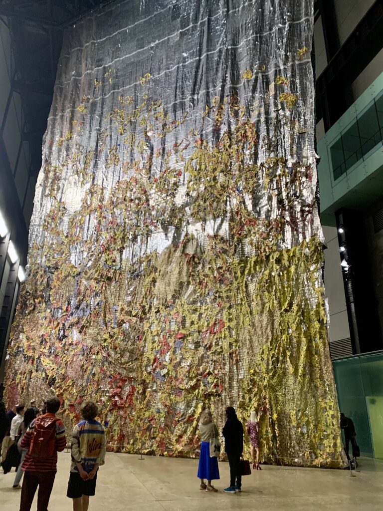 Tate Modern Turbine Hall commission by El Anatsui. Photo by Caroline Banks